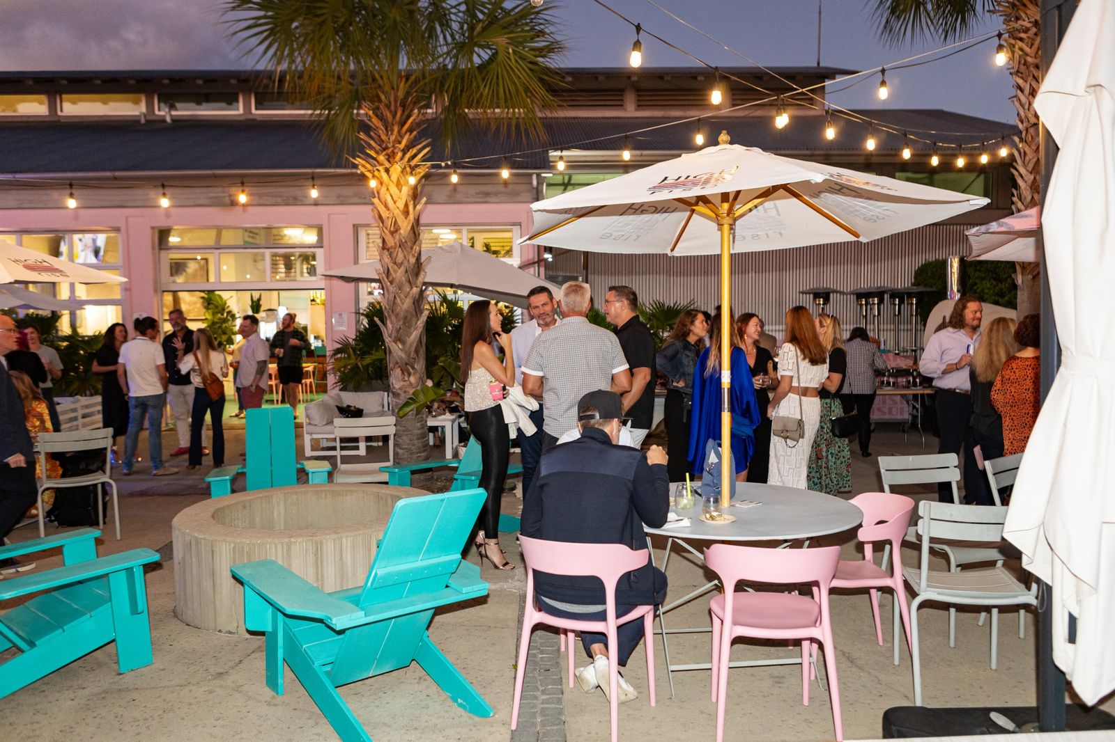 Evening reception on the patio under string lights