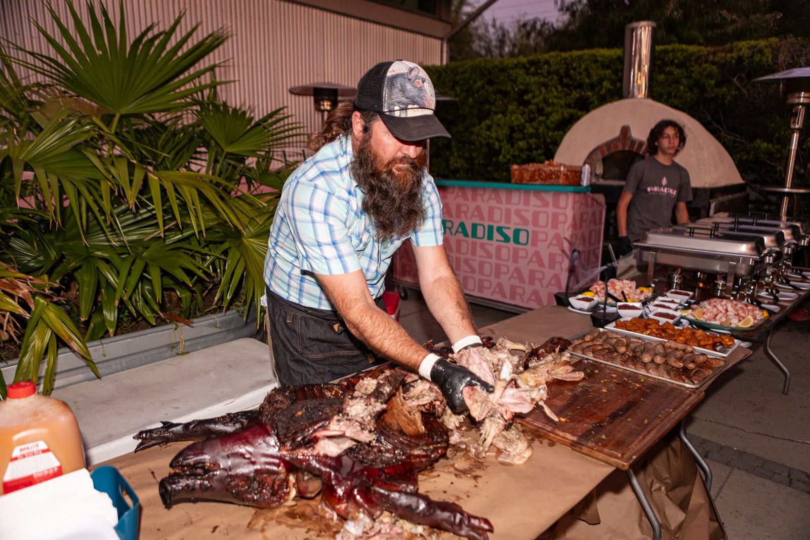 Whole-hog barbecue carved live at a Paradiso event
